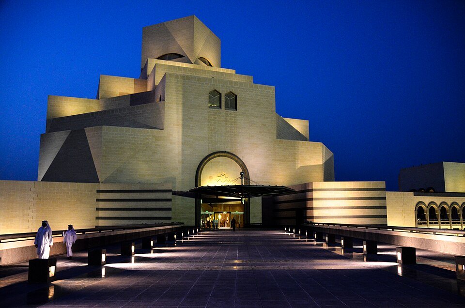 The Museum of Islamic Art illuminated at night in Doha, Qatar